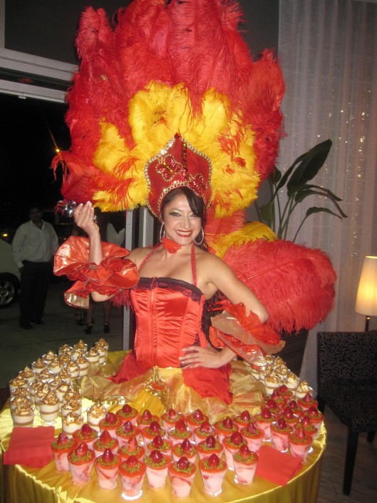 Vegas showgirl in red, yellow, gold
