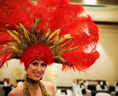 vegas showgirl gold and red feathers