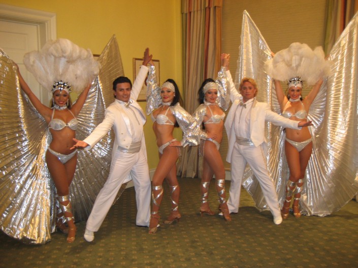 vegas showgirls and entertainers in white